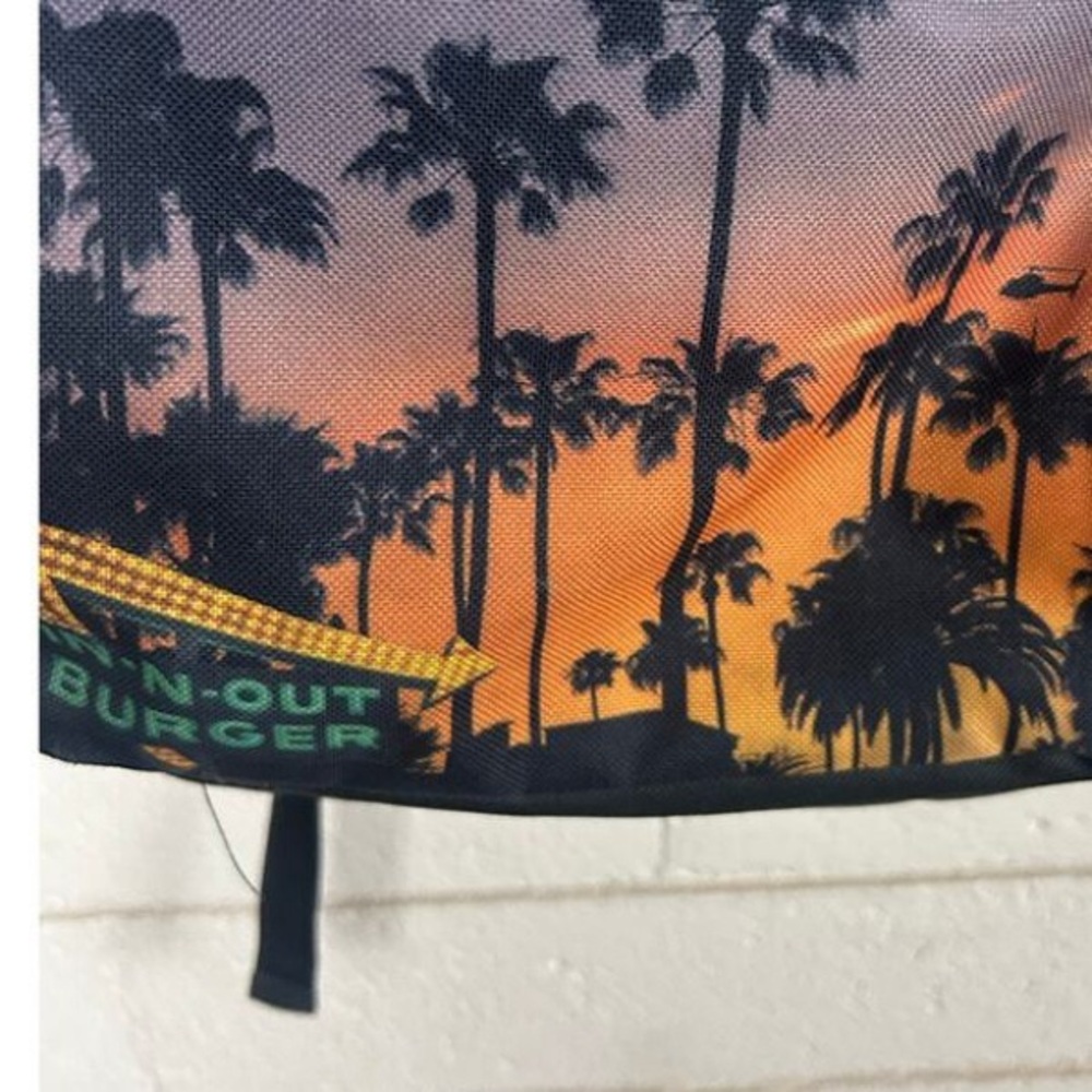 Black Backpack With Sunset Design - image 3